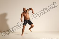 Underwear Gymnastic poses Man Black Muscular Bald Dancing Dynamic poses Academic